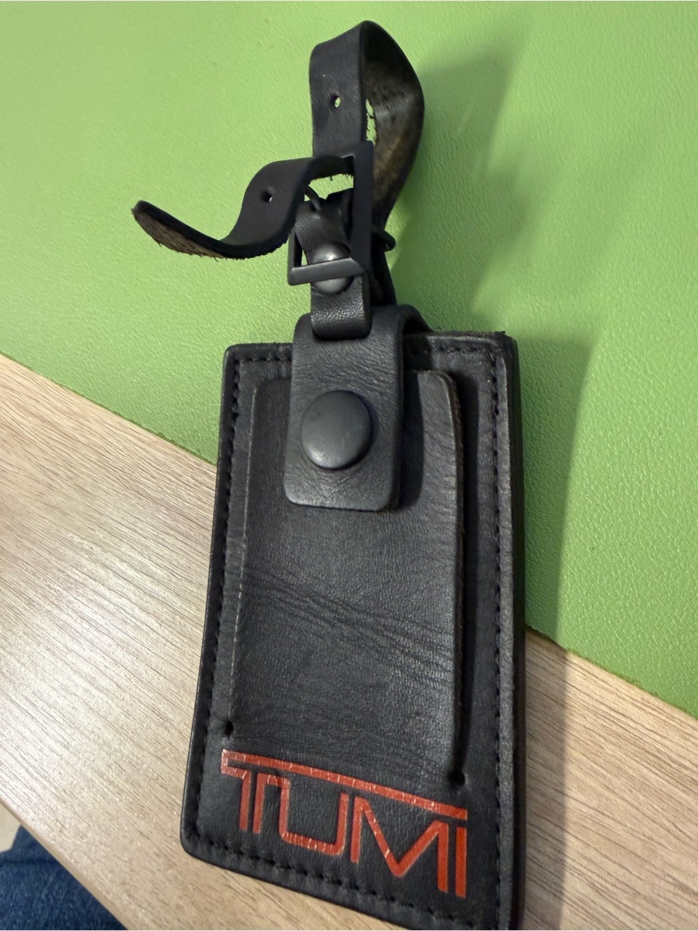 Tumi Black Leather Luggage Tag with Orange Logo